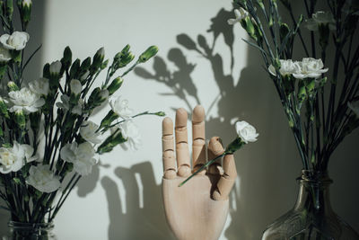 Close-up of flower vase on table