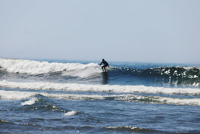 Surfer riding the wave