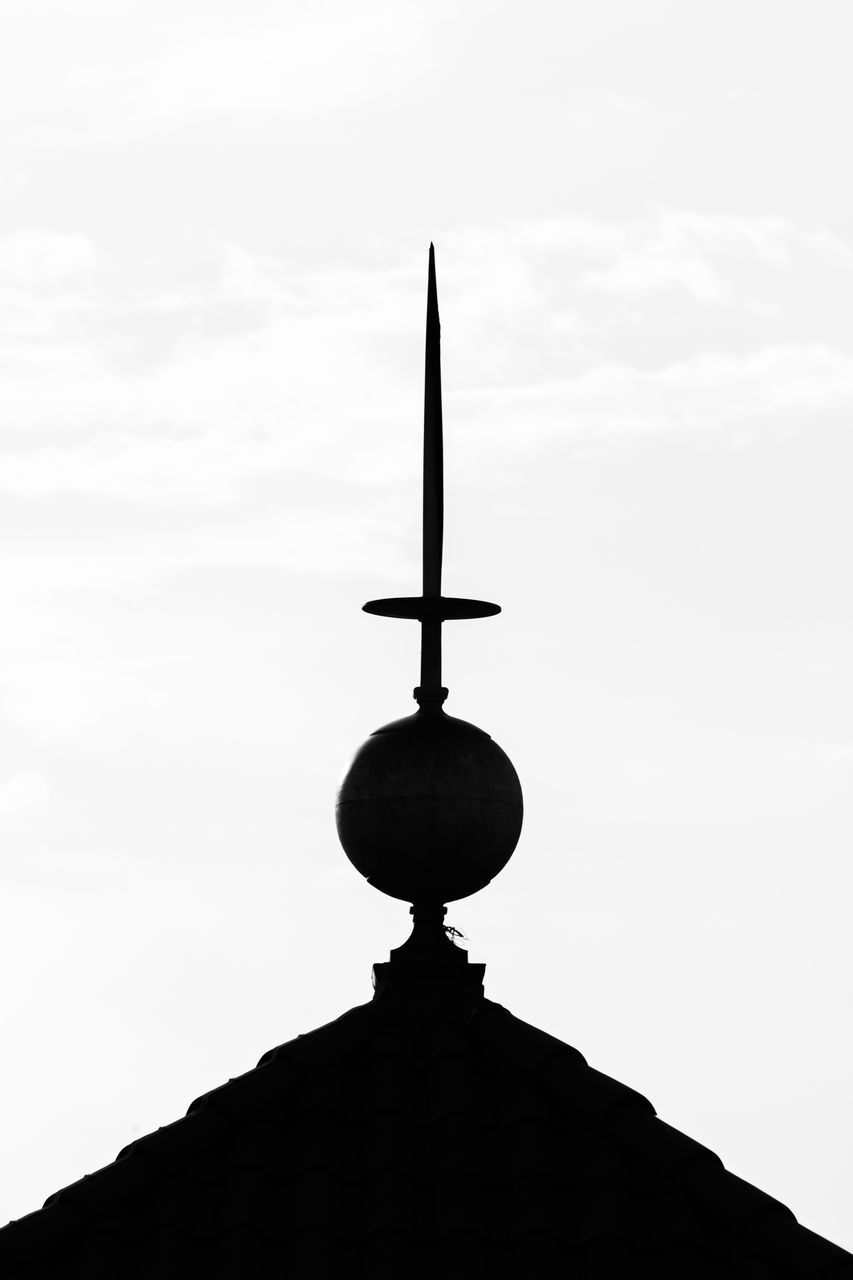 LOW ANGLE VIEW OF SILHOUETTE CROSS ON ROOF AGAINST SKY