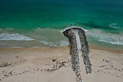 High angle view of beach by sea