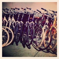 Bicycles parked in front of wall