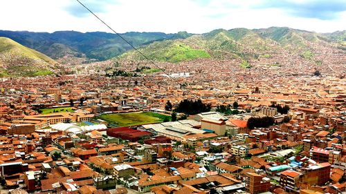 Townscape with mountain range in background