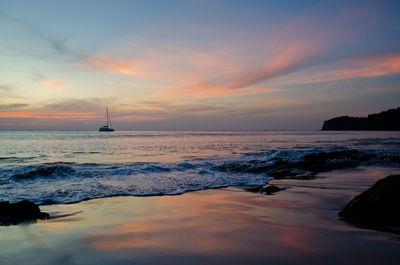 Scenic view of sea against sky during sunset