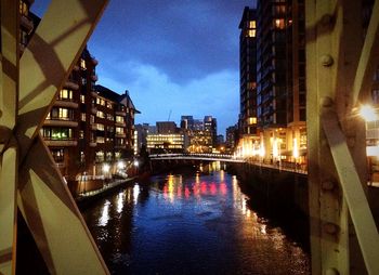 Illuminated buildings in city at night