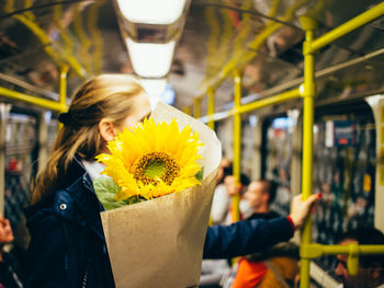 Close-up of woman in train