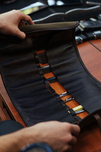 Cropped image of man holding guitar