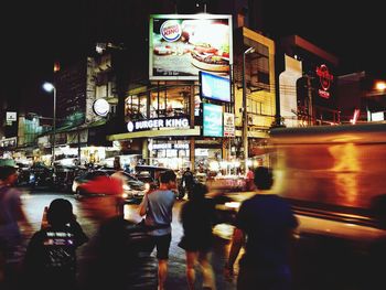 Crowd in city at night