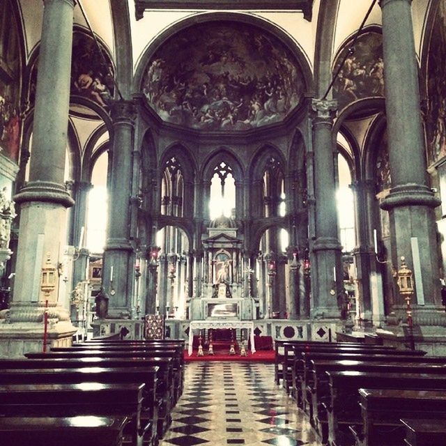 architecture, indoors, arch, built structure, church, place of worship, religion, the way forward, architectural column, corridor, spirituality, column, in a row, empty, building exterior, history, colonnade, diminishing perspective