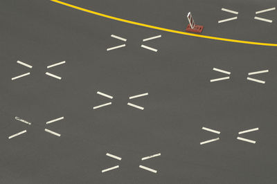 Close-up of arrow symbol on road