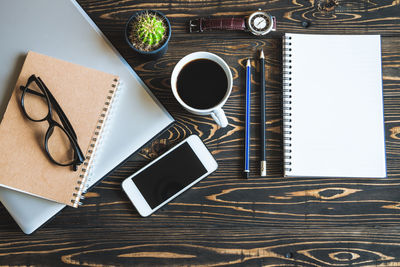 High angle view of coffee cup on table