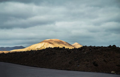 Scenic view of desert against sky