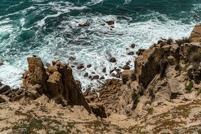 High angle view of rocks on beach