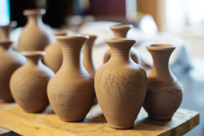Close-up of pots at workshop