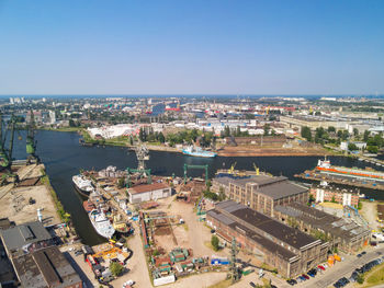 High angle view of buildings against clear sky