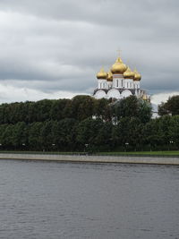 View of temple against cloudy sky