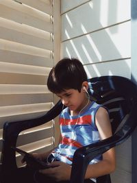 Girl sitting on chair