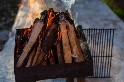 Close-up of bonfire on barbecue grill