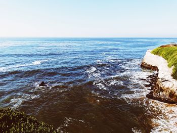 Scenic view of sea against clear sky