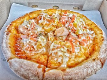 High angle view of pizza on table