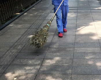 Low section of man walking on floor