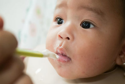 Close-up portrait of cute baby girl