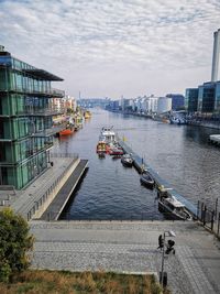 High angle view of river amidst buildings in city