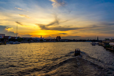 Scenic view of sea against sky during sunset