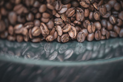 Close-up of coffee beans on table