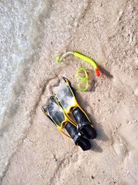 High angle view of leaf on sand