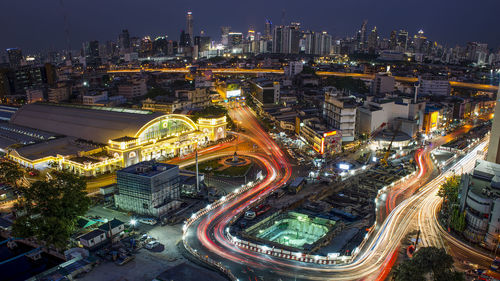 High angle view of illuminated cityscape at night