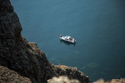 High angle view of ship sailing in sea