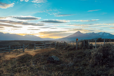 Scenic view of landscape against sky during sunset