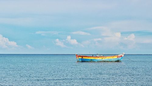 Boat sailing in sea