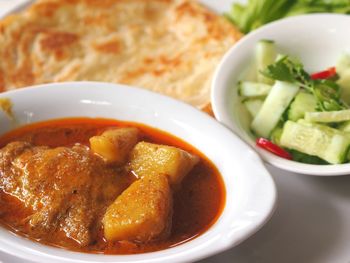 Close-up of food served in bowl and plate