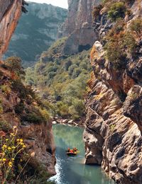 High angle view of rocks amidst trees on rock formation