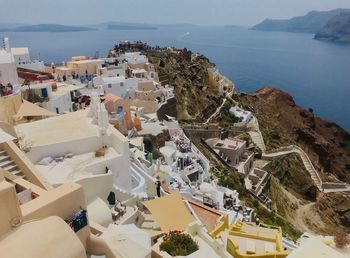 High angle view of townscape by sea