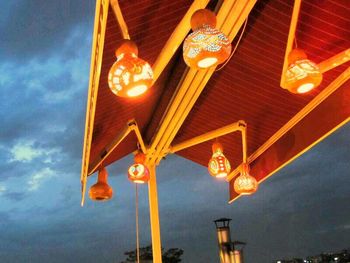 Low angle view of illuminated lights