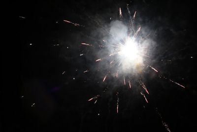Low angle view of firework display