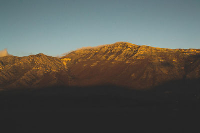 Scenic view of mountains against clear sky