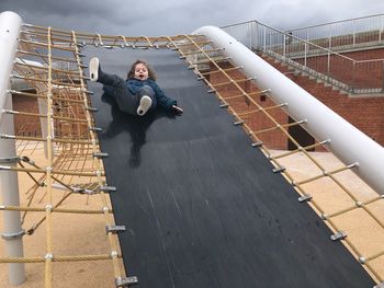 High angle view of woman on railing