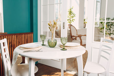 Potted plants on table at home