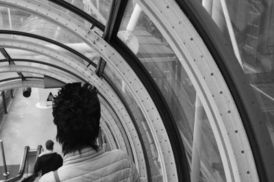 Rear view of people traveling in bus