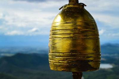 Golden bell isolated on nature background.