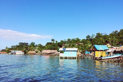 View of swimming pool against clear blue sky