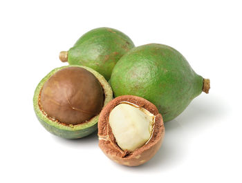 Close-up of fruits against white background