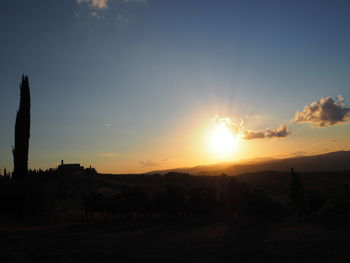 Sun shining over landscape