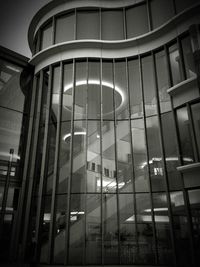 Low angle view of modern building in city at night