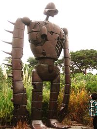 Statue in park against clear sky