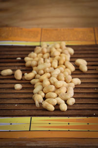 Close-up of garlic on wooden table