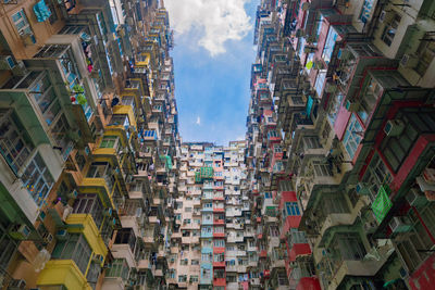 Low angle view of buildings in city against sky